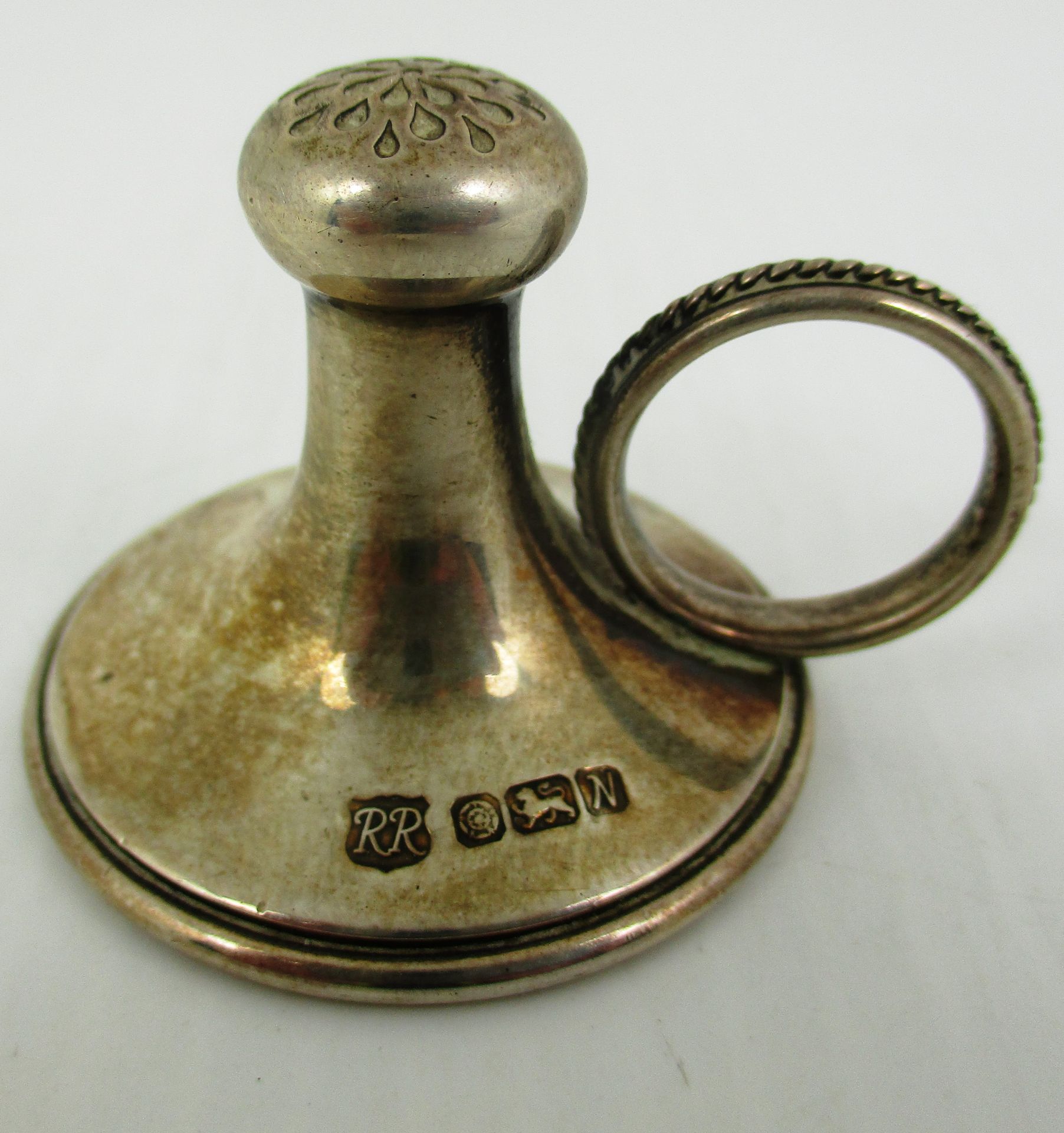 A silver candle snuffer with finger loop, by Russell C Rimes, Sheffield 1987 (total approx weight 0.