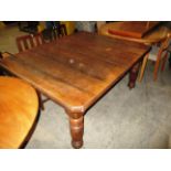 A mahogany extending dining table (one leaf) on bulbous turned legs 120 x 140cm extended