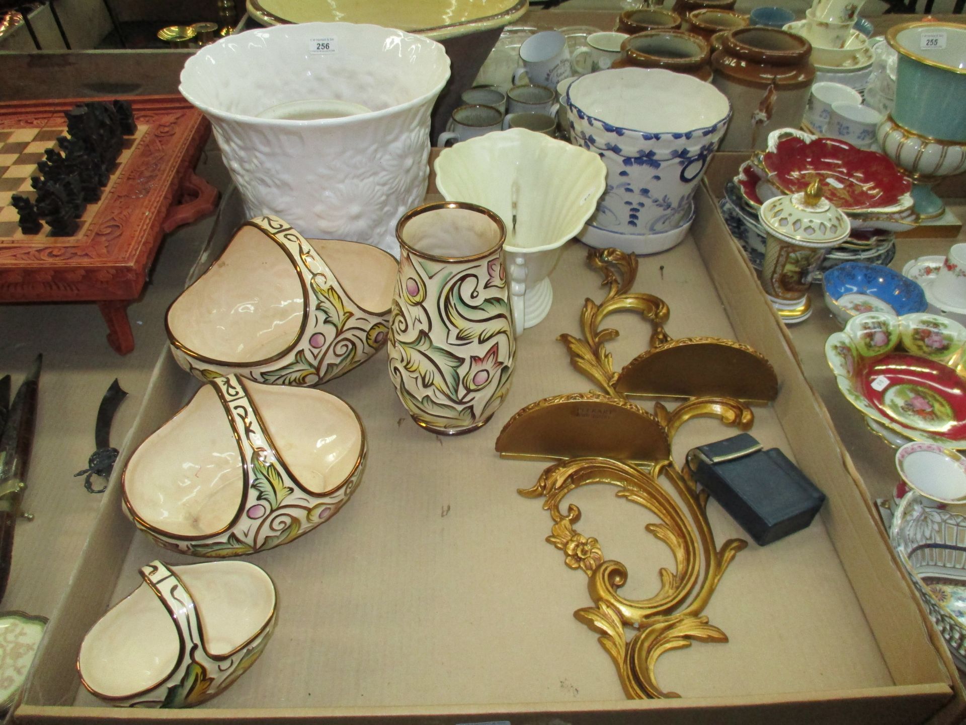 A four piece set of Wade "Gothic" patterned ware, a decorative gilt shelf,