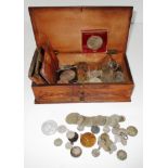 Carved wooden box and a quantity of mixed coins including some pre 1947 silver