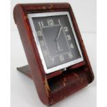 LeCoultre Swiss Eight Days folding travel clock with red leather case