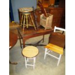 A small inlaid side table, a gilt wood framed stool with revolving seat, 2 magazine racks, chair,