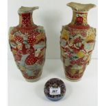 A pair of Satsuma pottery baluster vases, painted in the round with figural scenes (Both A/F), 32.