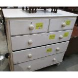 A white painted pine 5 drawer (2 short,