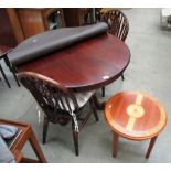 A stained mahogany circular dining table on centre tripod support 98cm dia.