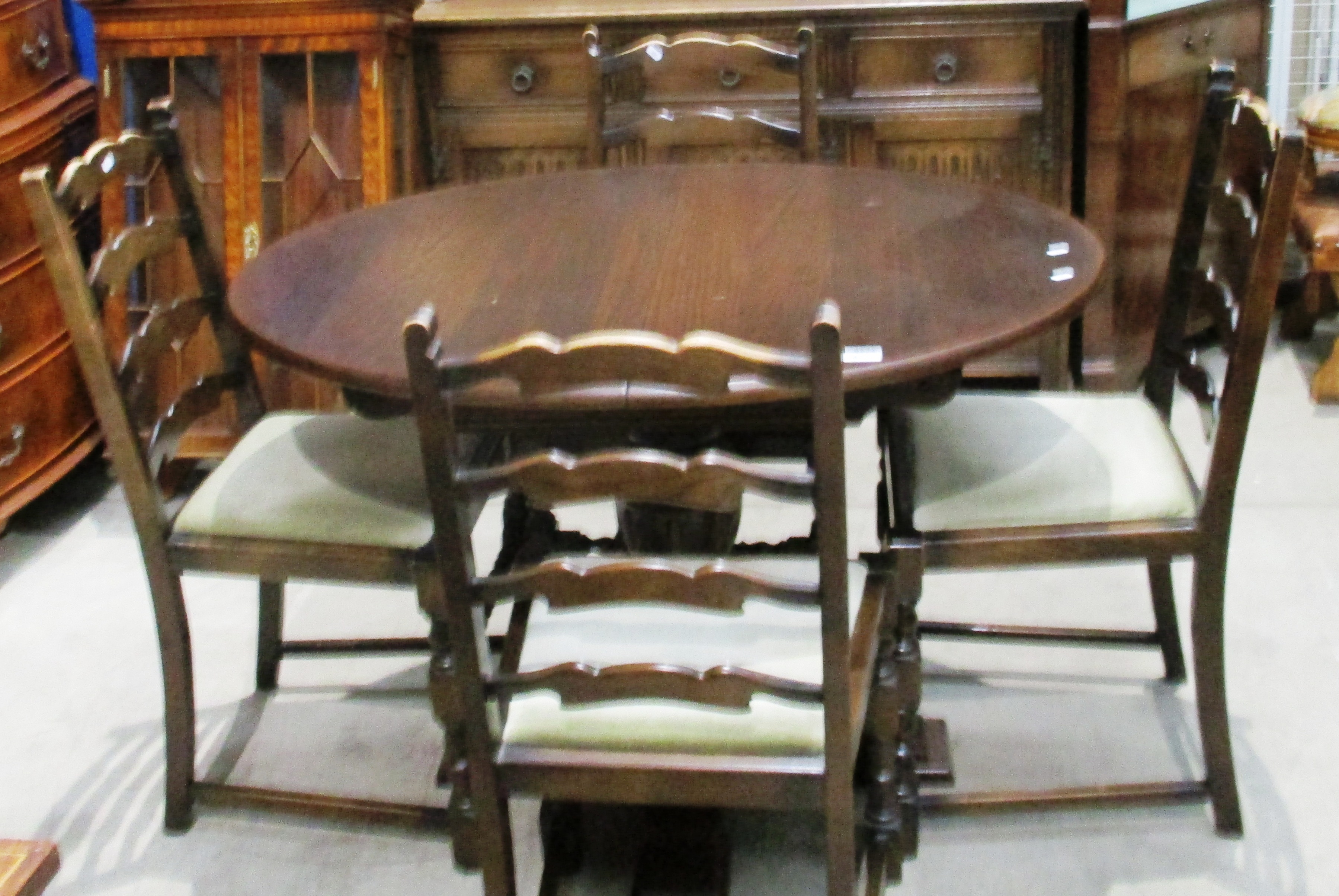 An oak extending dining table,