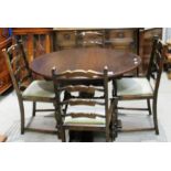 An oak extending dining table,