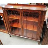 A mahogany double glazed door display cabinet 110cm on cabriole legs