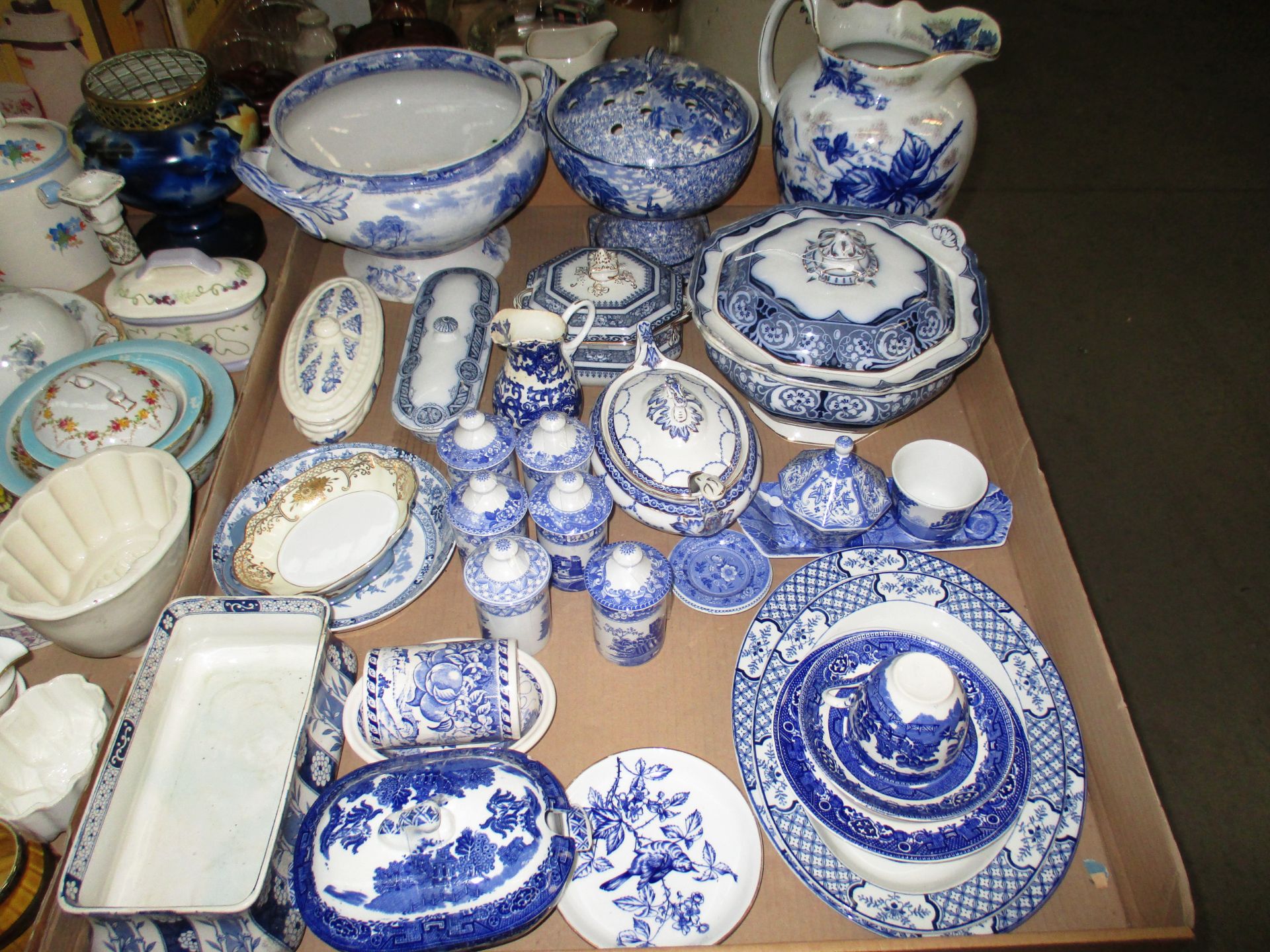 A large quantity of assorted blue and white china/pottery/ceramics by Fenton, Burleigh ware, Spode,