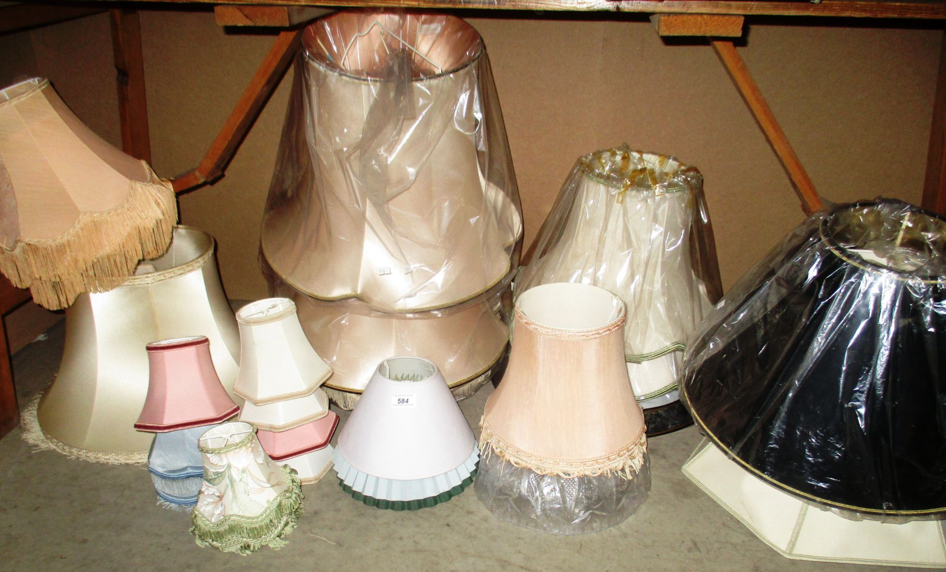 A large quantity of assorted lamp shades