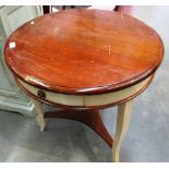 A mahogany and cream painted single drawer circular table on tripod base 68cm