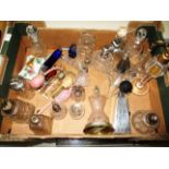 Contents to tray - quantity of assorted cut glass and other scent bottles (some silver collared),