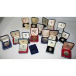 Various cased coins and medals including silver proof £2. 1995, and £1. 1955, £1. 1986, £1.