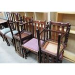 A pair of oak dining chairs,