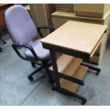 Pine finish mobile computer table and a pink cloth upholstered office swivel armchair