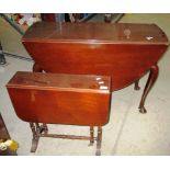 A Georgian style mahogany drop leaf dining table and a mahogany Sutherland table (2)