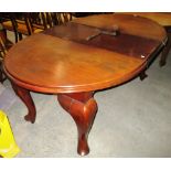 A mahogany oval extending dining table (1 leaf) 115 x 184 cm extended (as seen) complete with