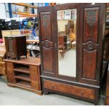 A mahogany wardrobe with centre mirror door and under drawer 117cm x 182cm and a mahogany six
