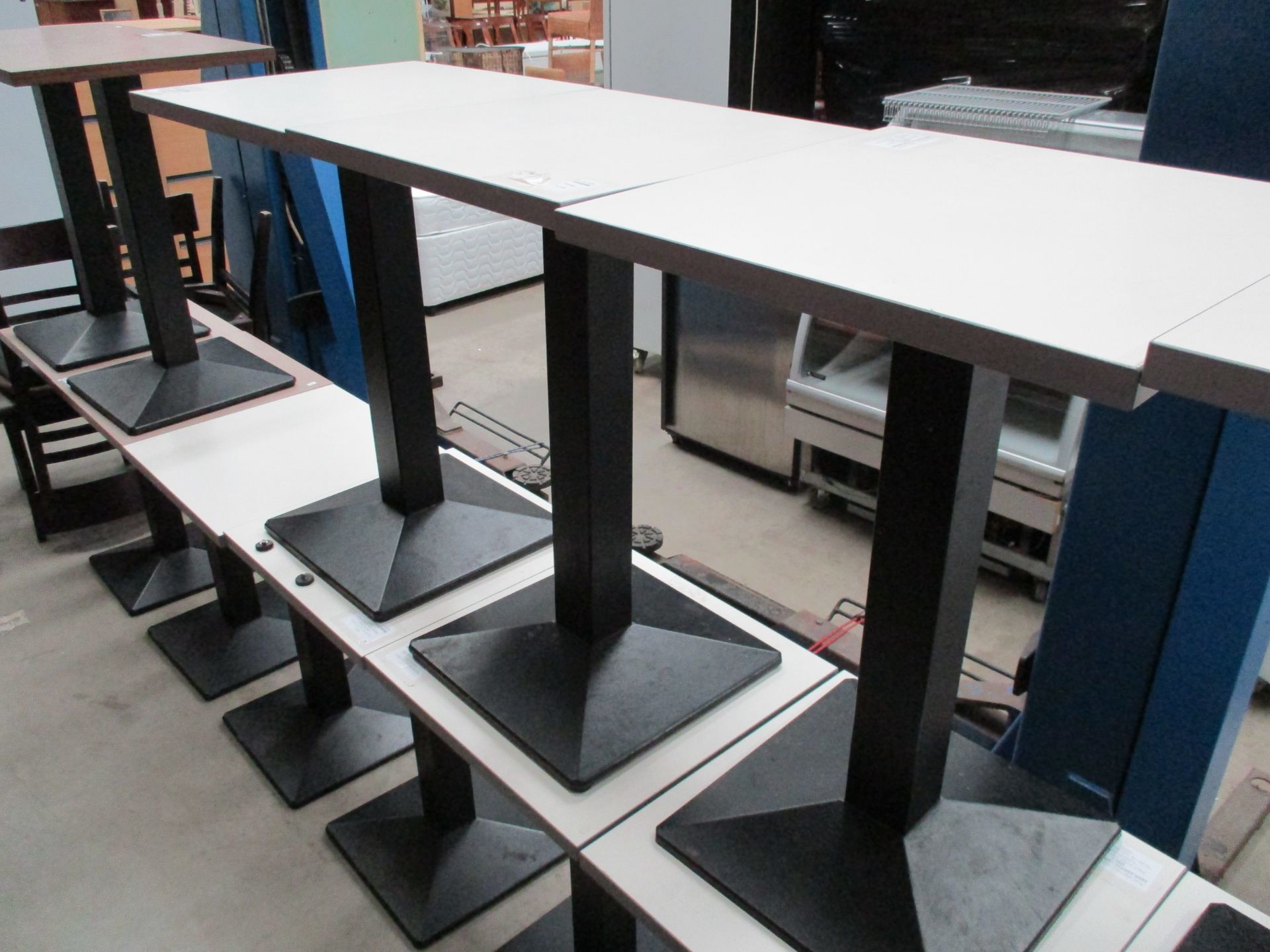 4 x white formica top cafe tables on black metal bases 50 x 50cm