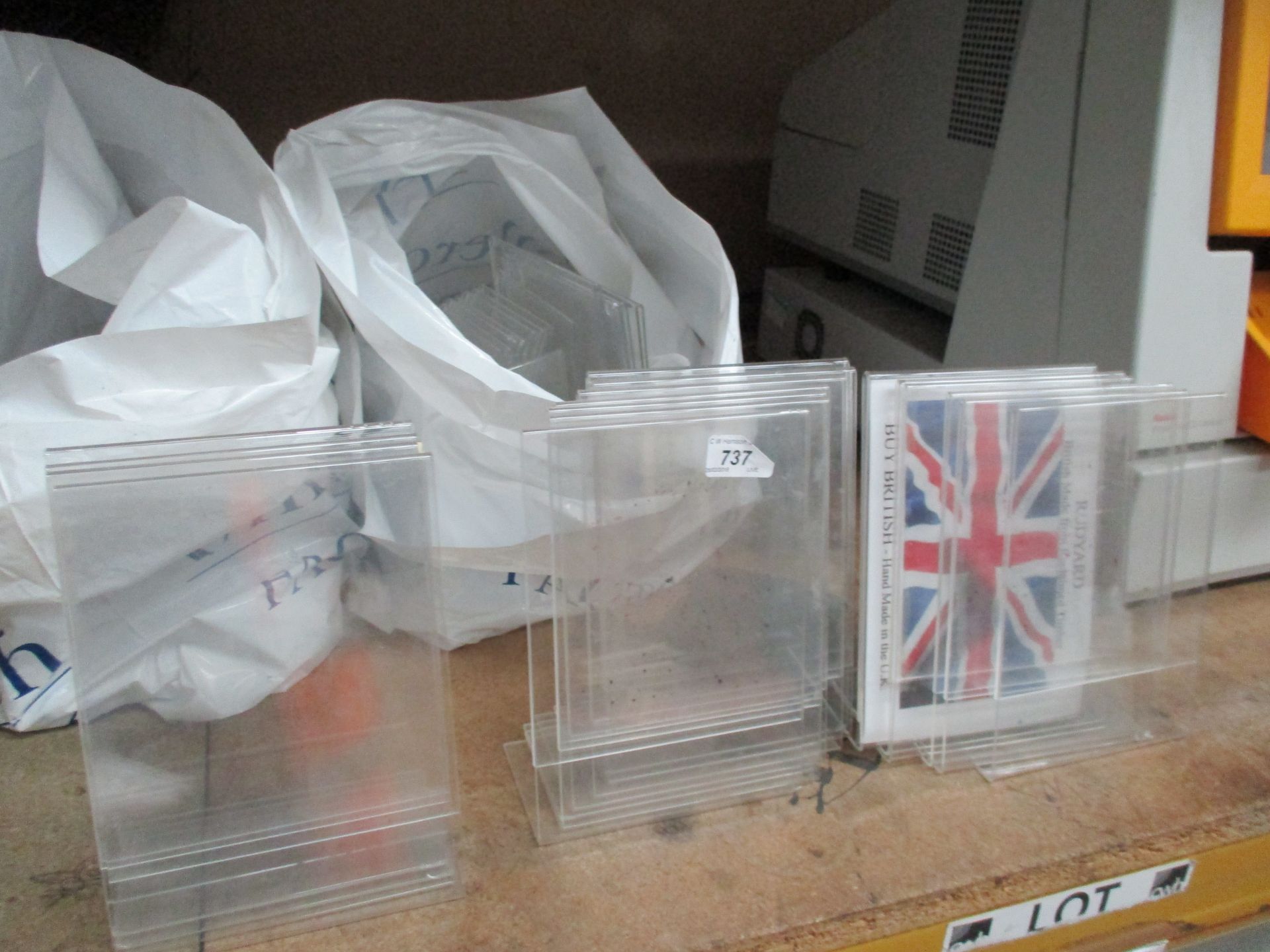 A quantity of plastic display stands