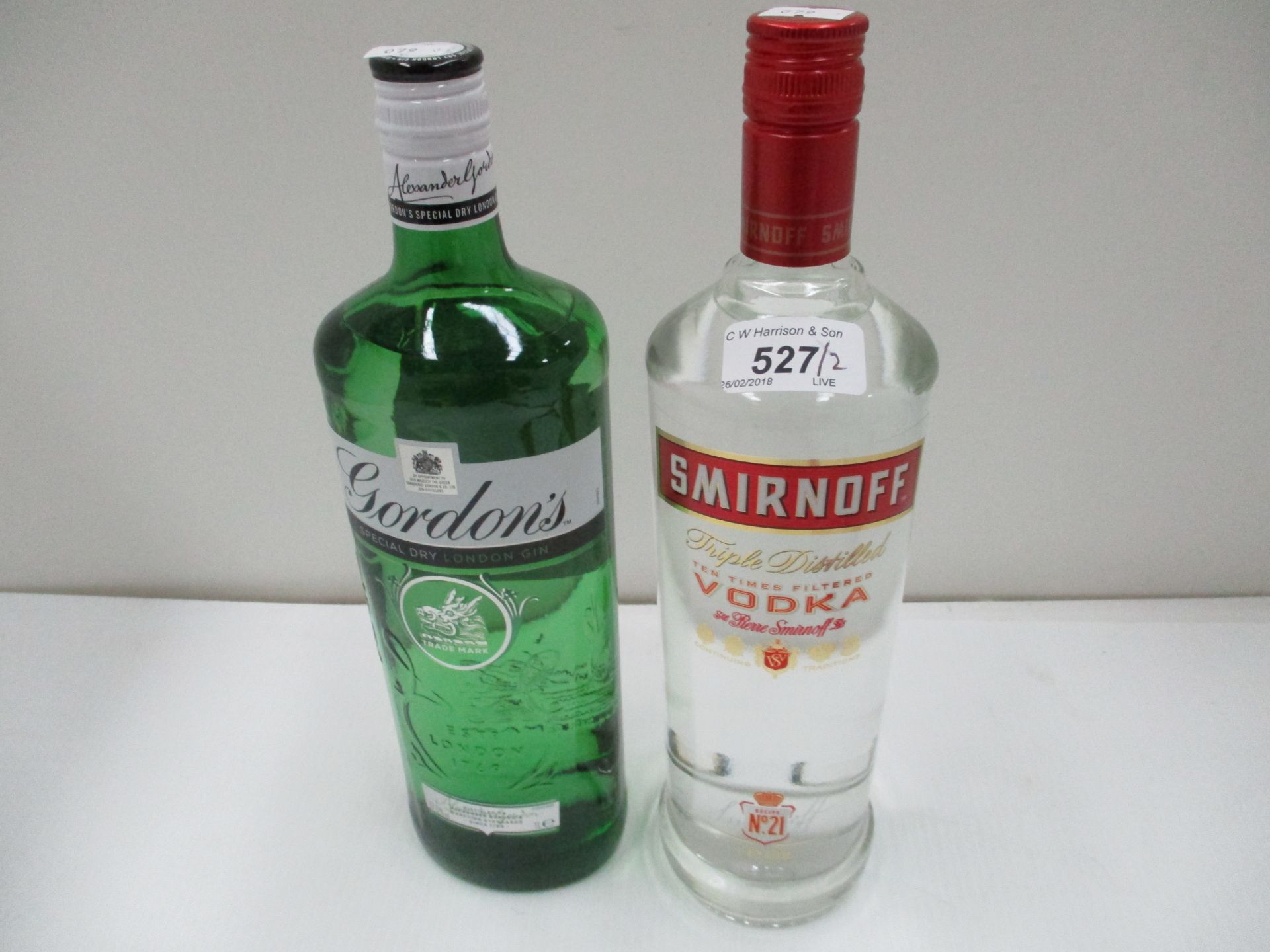 A one litre bottle of Gordon's Special Dry London gin and a one litre bottle of Smirnoff vodka (2)