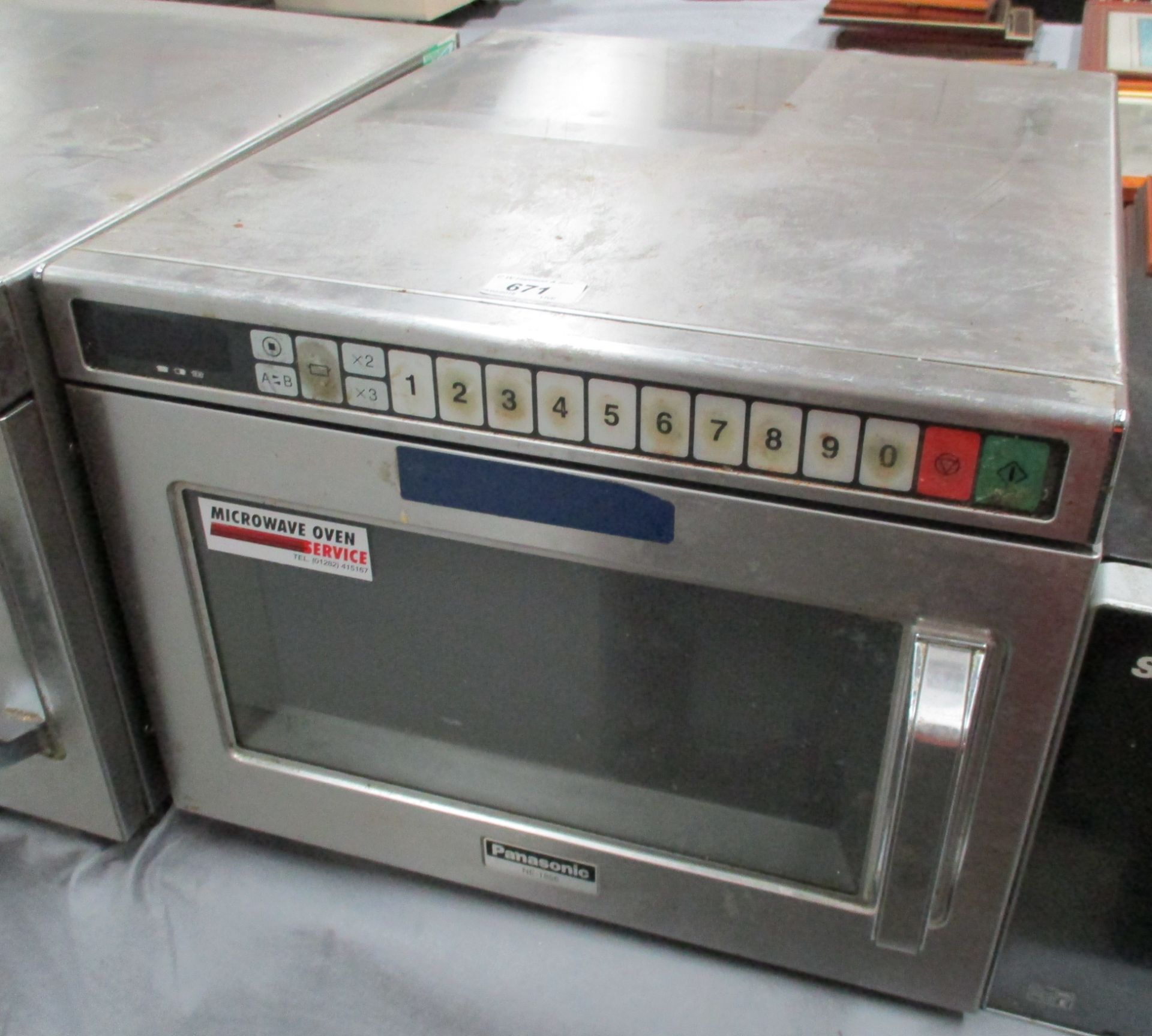 A Panasonic NF-1856 stainless steel commercial microwave oven