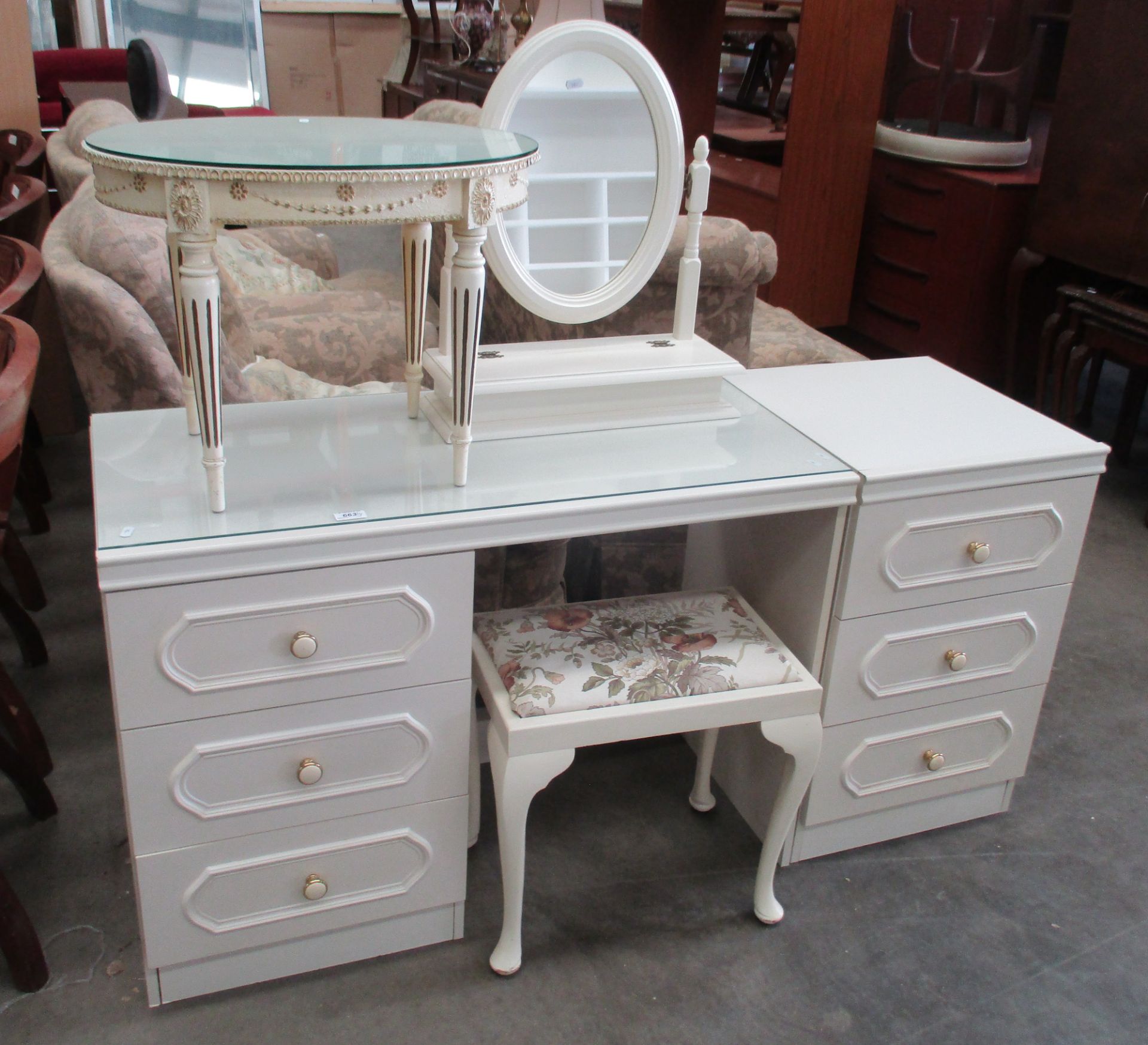 A cream laminate 3 drawer dressing table complete with stool and glass top,