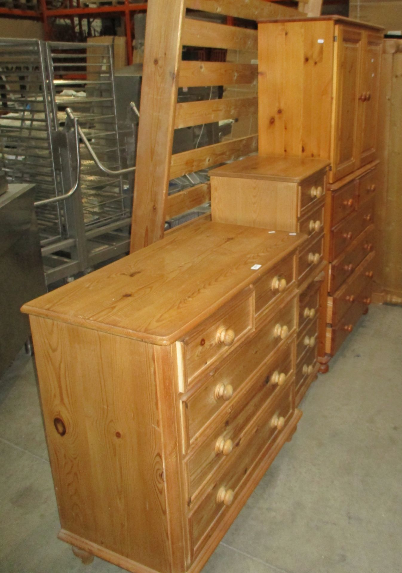 A pine 5 piece bedroom suite comprising 2 door/6 drawers (4 long,