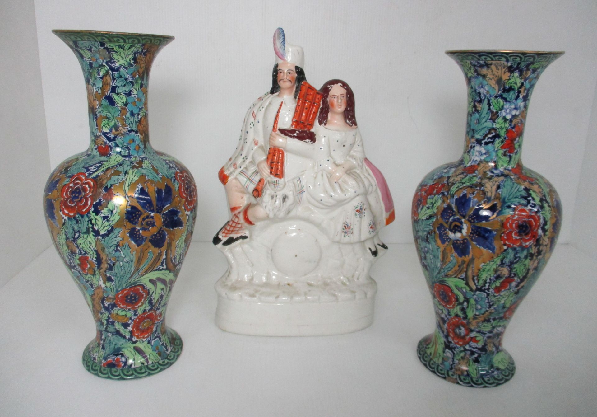 A pair of vases by Barker Bros Ltd decorated in "Bruges" pattern [33.