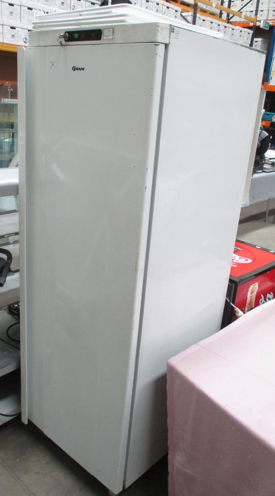 A Gram K400LU upright lockable freezer c/w keys