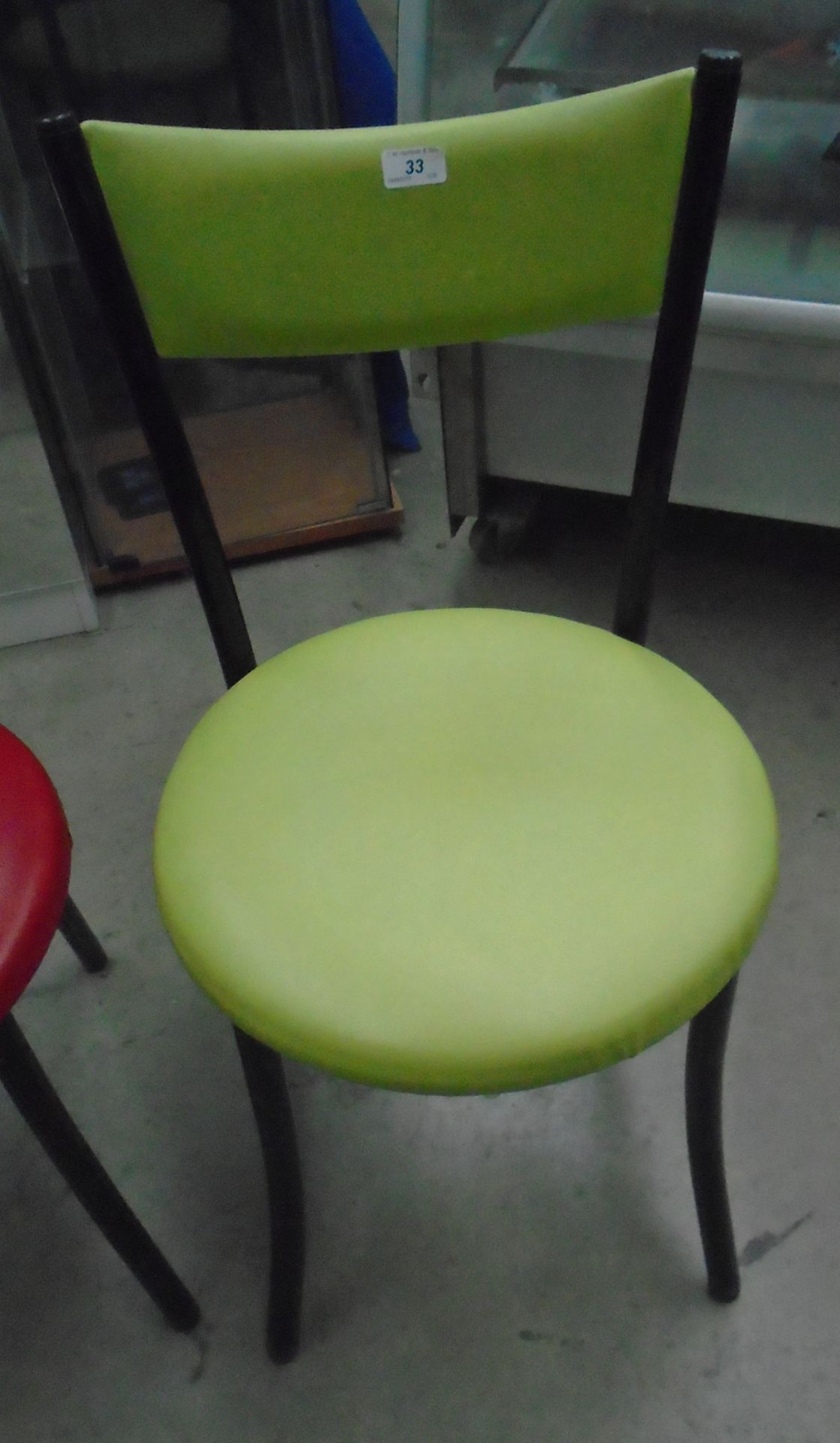 12 x black metal framed cafe chairs with green vinyl upholstery