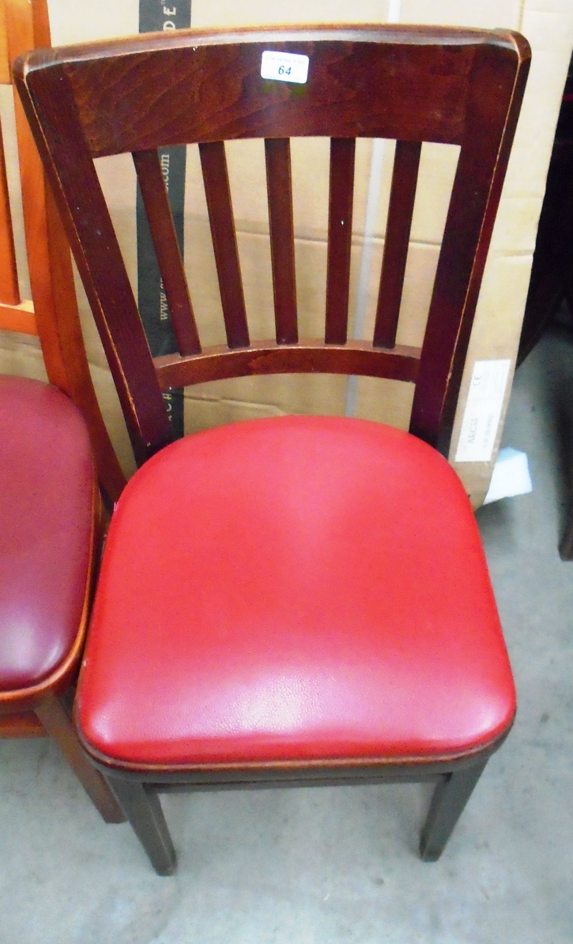 28 x stained wood cafe chairs with red vinyl upholstery