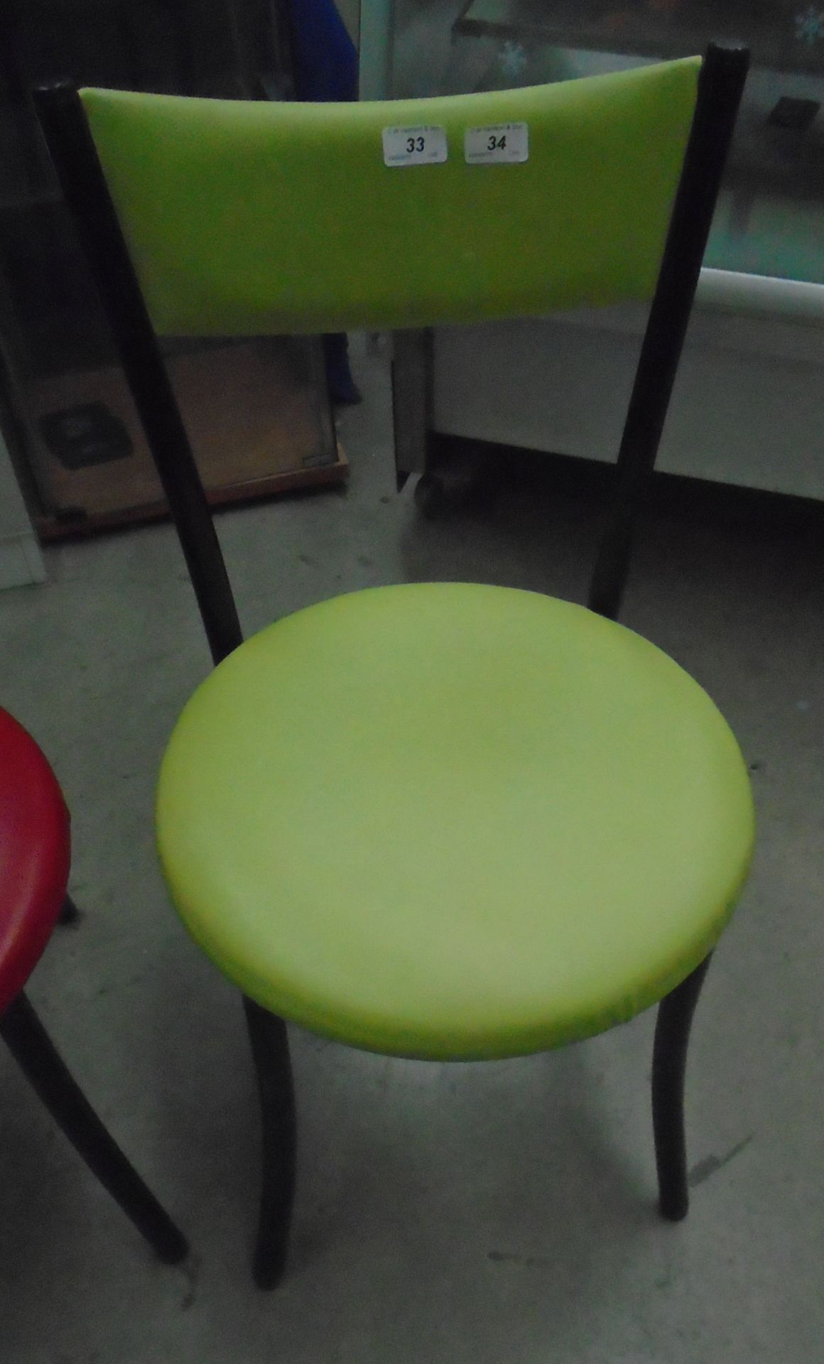 12 x black metal framed cafe chairs with green vinyl upholstery