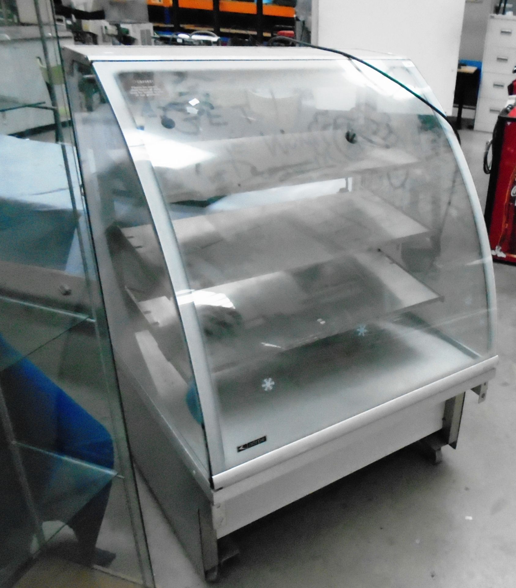 A Norpe Saga 90-W-RST curved glass front mobile food display unit - 240v