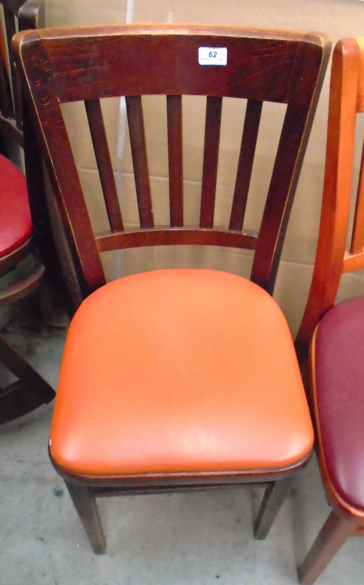 29 x stained wood cafe chairs with orange vinyl upholstery