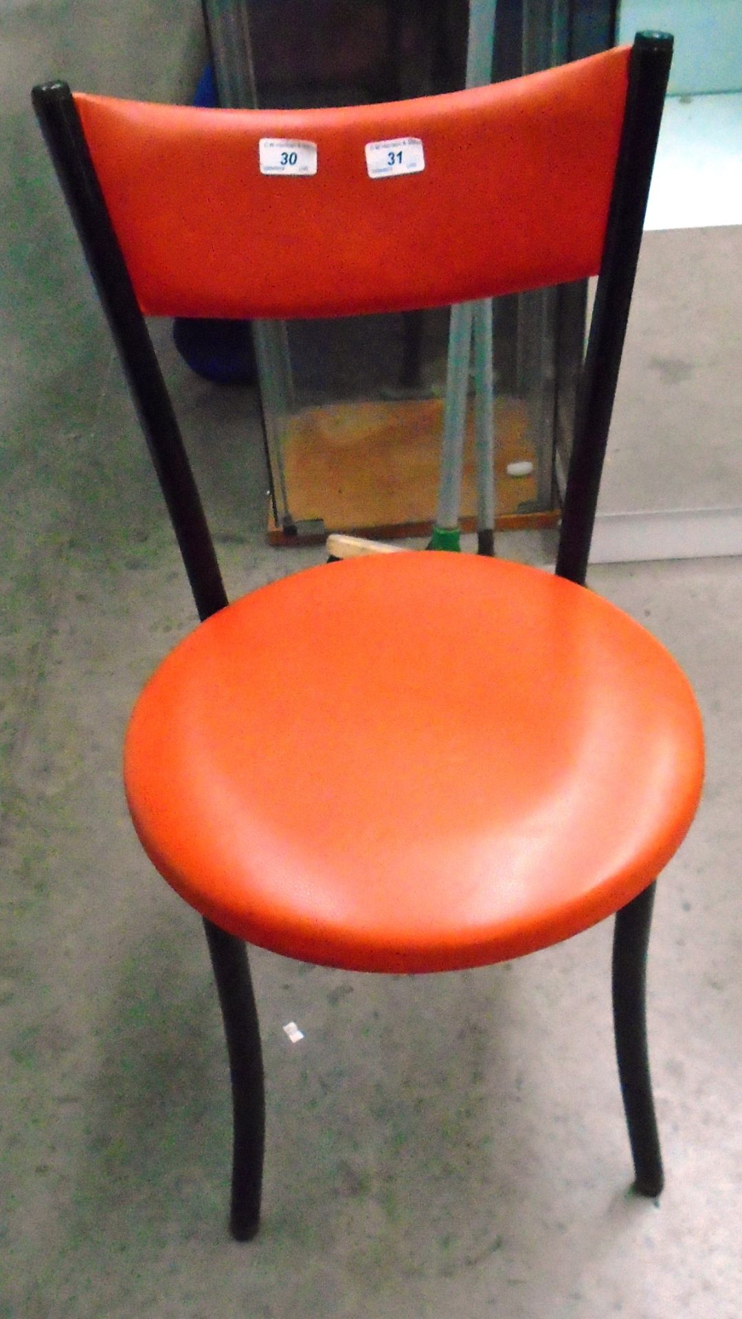 10 x black metal framed cafe chairs with orange vinyl upholstery