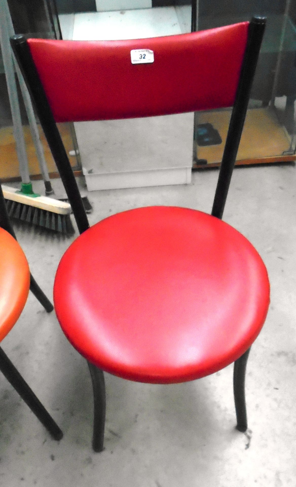 17 x black metal framed cafe chairs with red vinyl upholstery