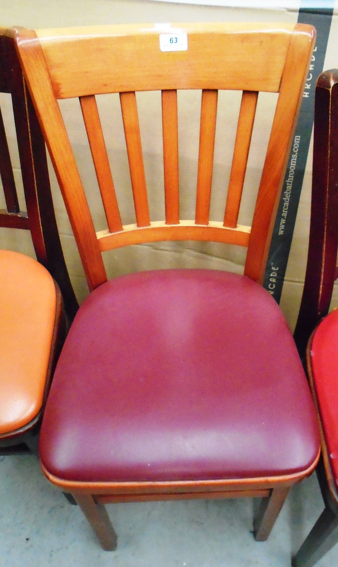 25 x stained wood cafe chairs with burgundy vinyl upholstery