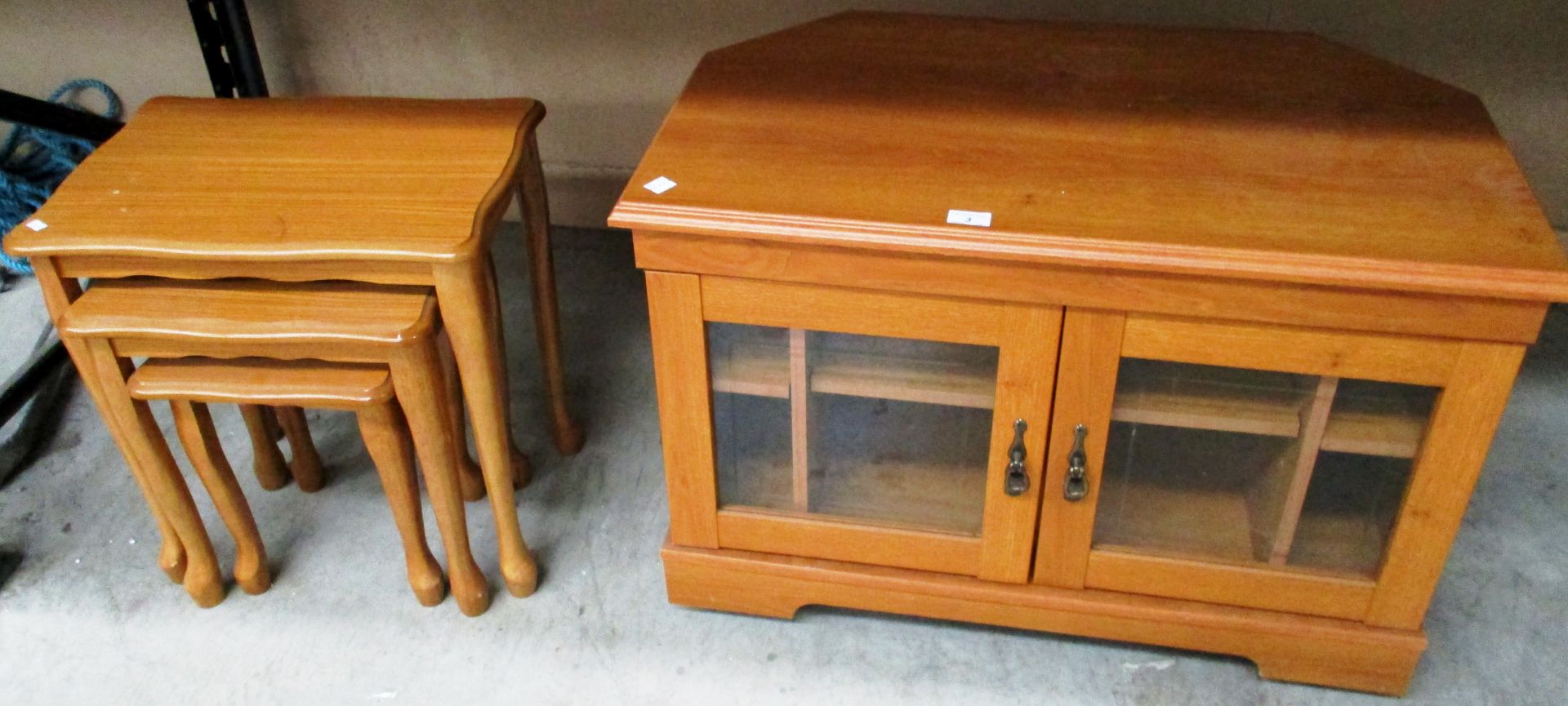 2 x items - teak nest of three tables and a teak double door glass front entertainment unit