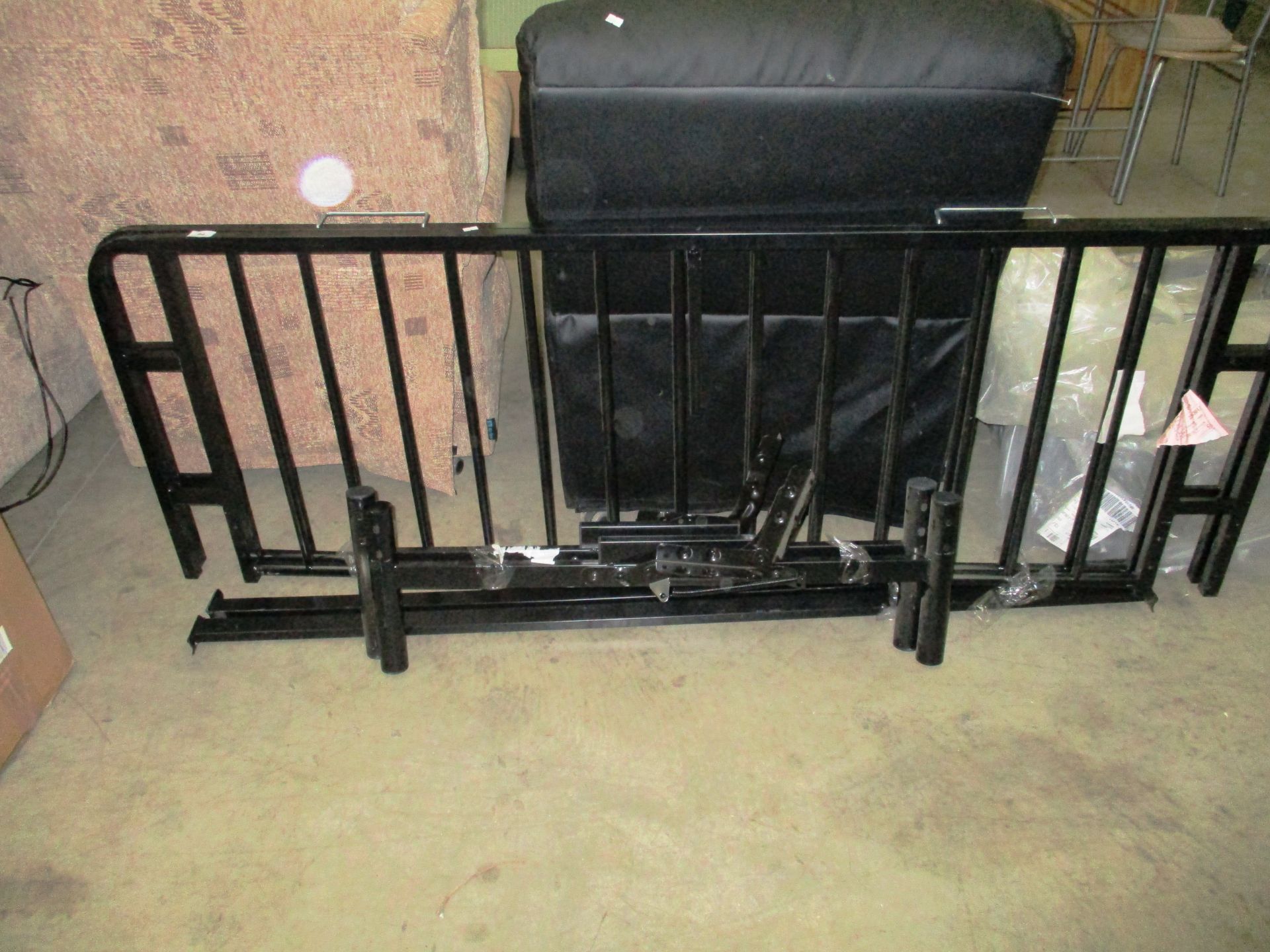 A black metal bed frame