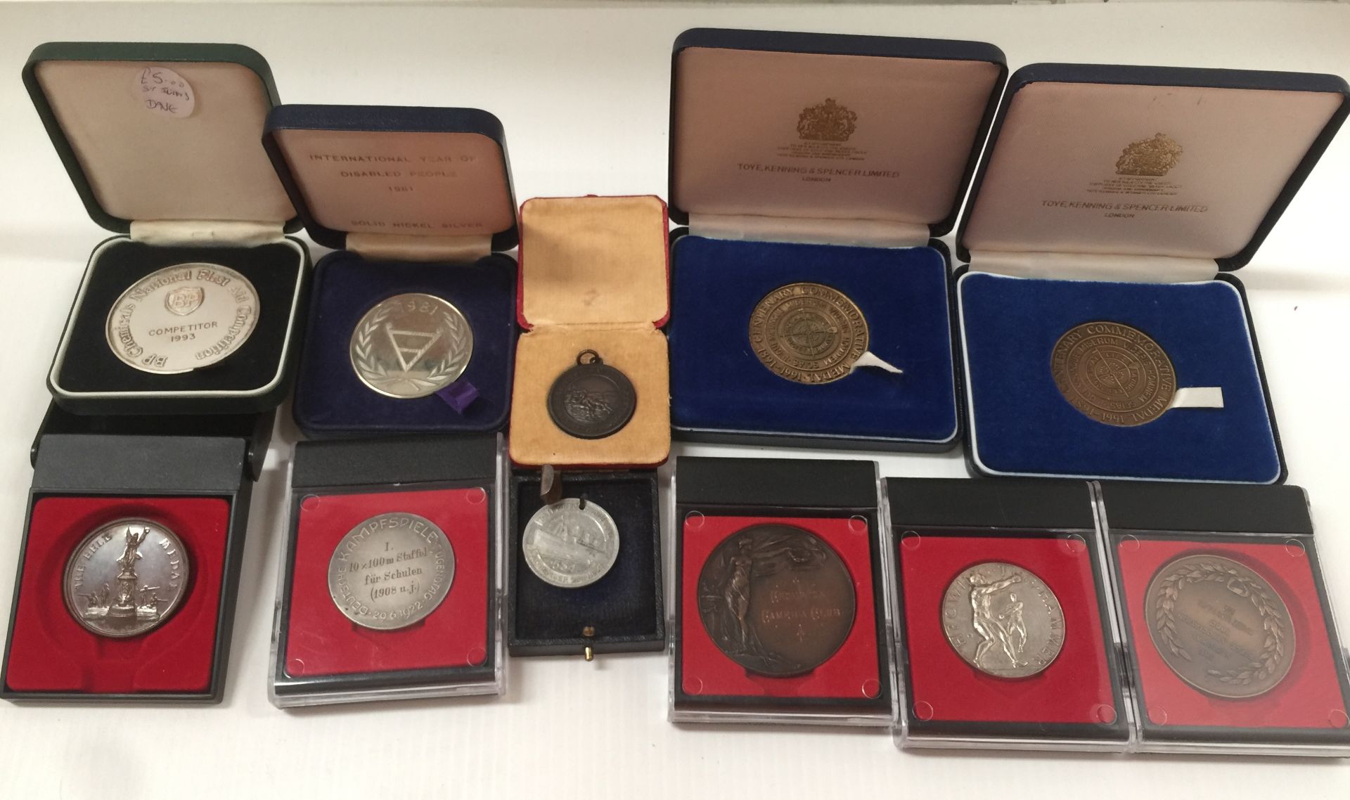 Twelve medals - Royal Society of Life Saving, miniature Rifle Association,