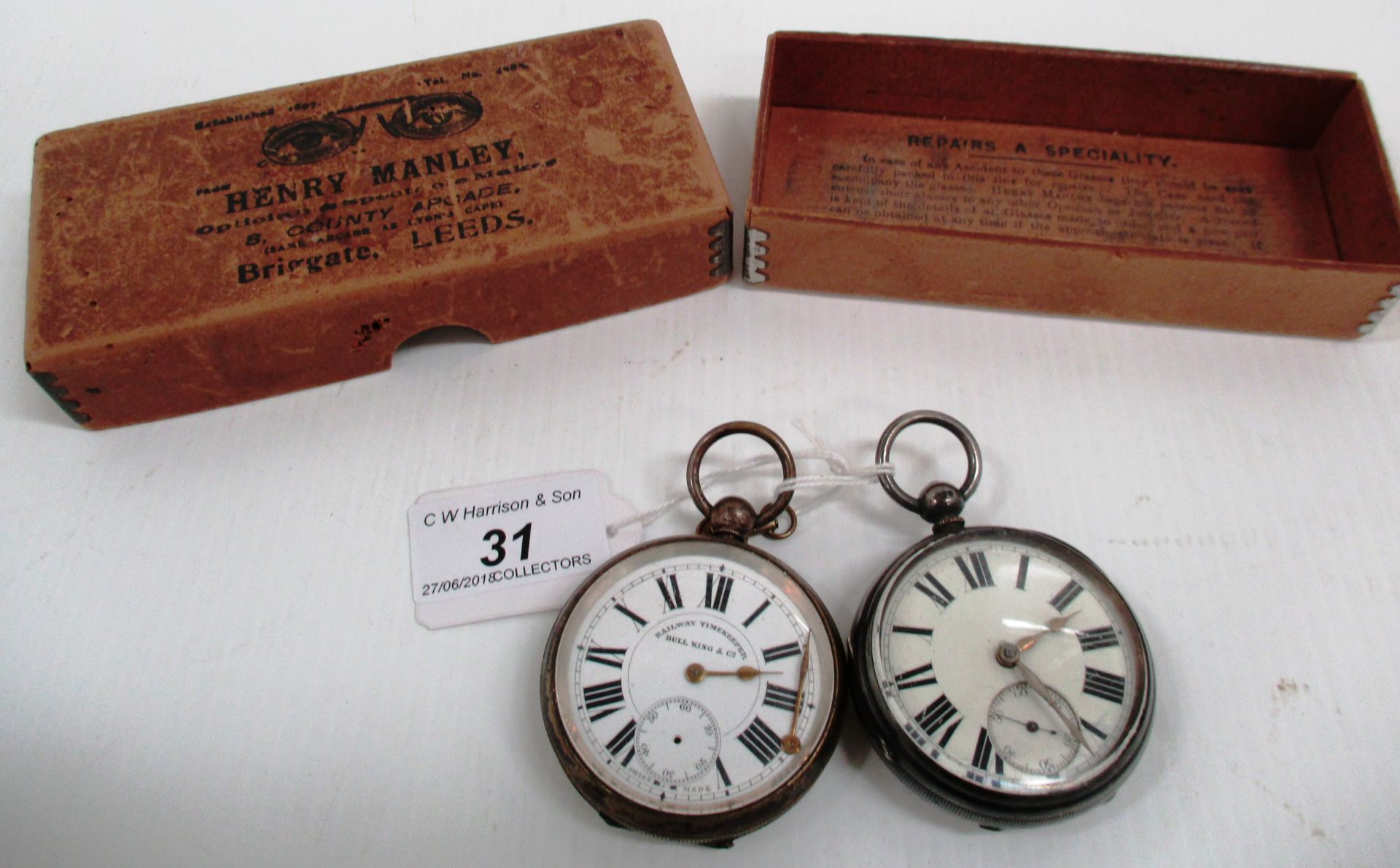 A silver cased pocket watch and another pocket watch