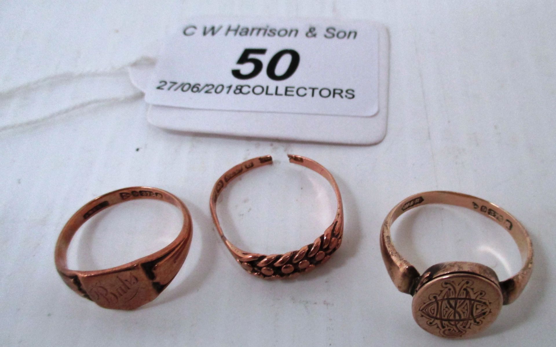 Three 9ct gold rings [total approximate weight 6.