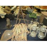 Nine items - two oil lamps, three spirit stoves, wooden chain, peat spade, tow jack,