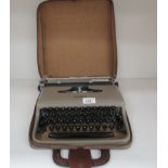 An Olivetti Lettera manual typewriter in a portable case