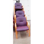 Seven wood frame armchairs with purple upholstered seats