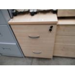 A pine finish two drawer pedestals (key)
