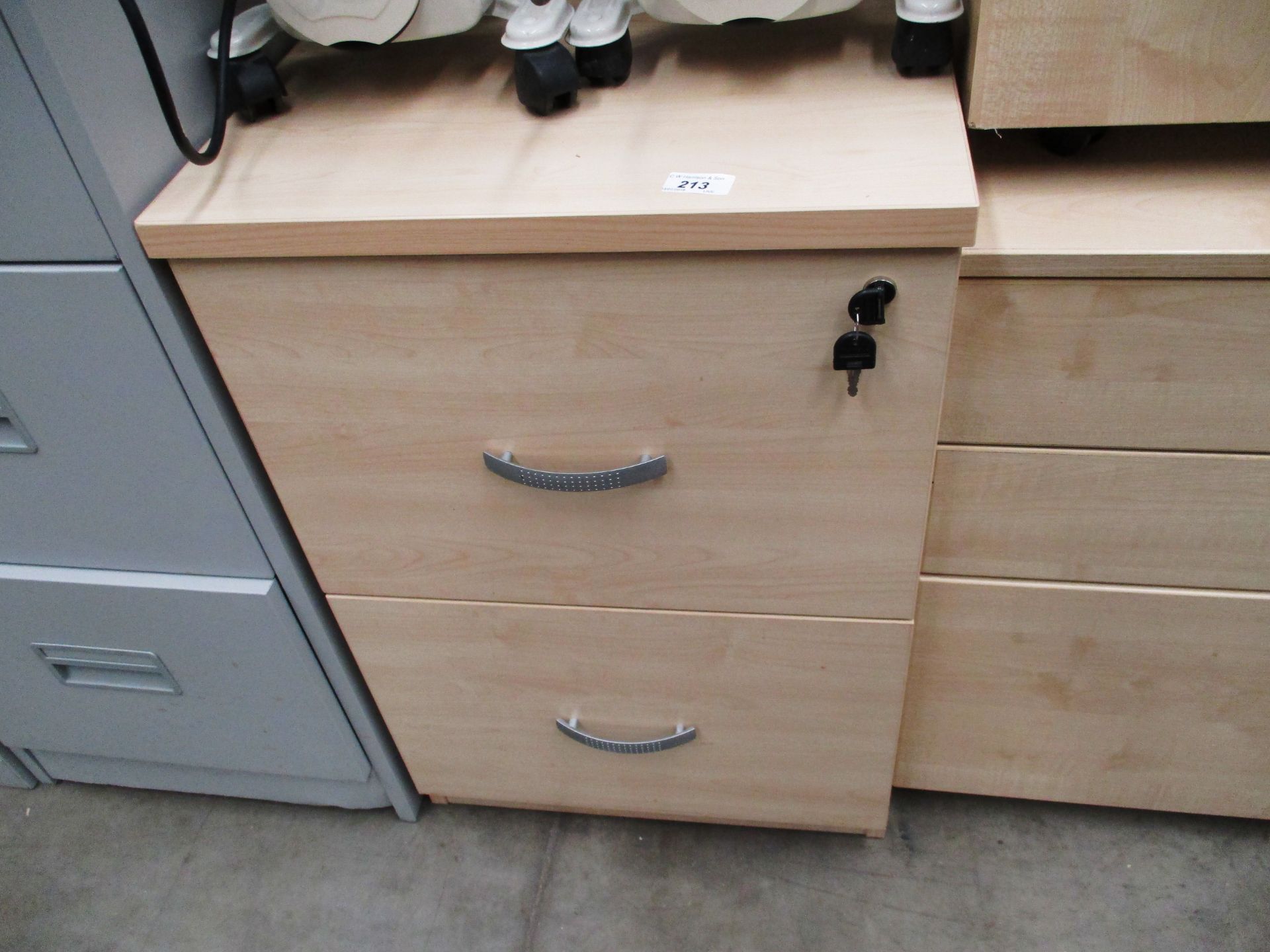 A pine finish two drawer pedestals (key)