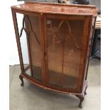 An astragal glazed display cabinet with two glass shelves