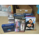 Contents to box - DVDs, CDs, playing cards,